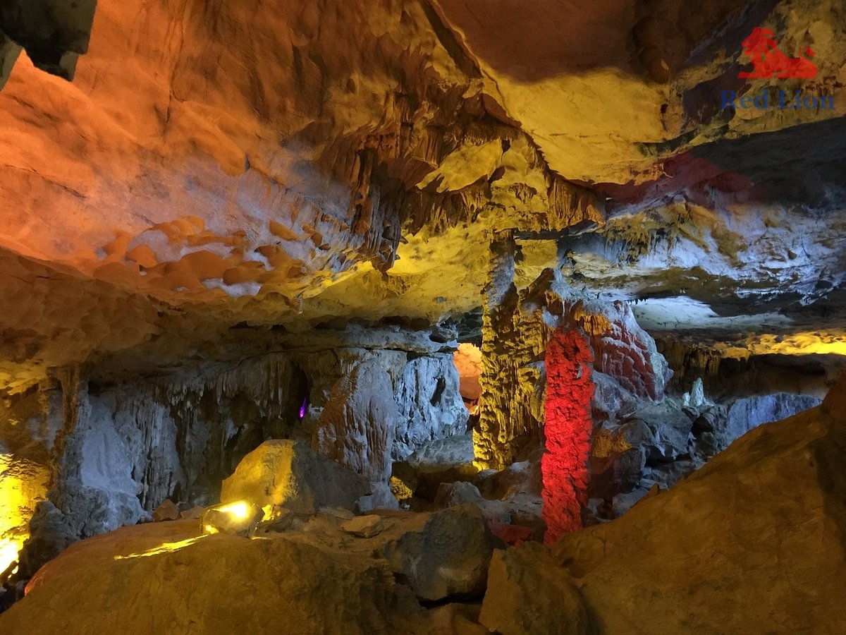 travel-ha-long-bay-travel-to-ha-long-bay-vietnam-sung-sot-cave-surprise-cave-red-lion-001-20240530-224354a-very-colourful-cave